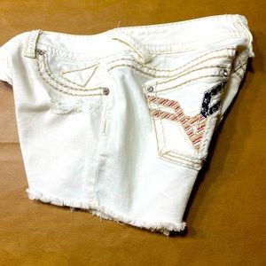 Cute white jean shorts. New! Never worn. Cute pocket detailing.